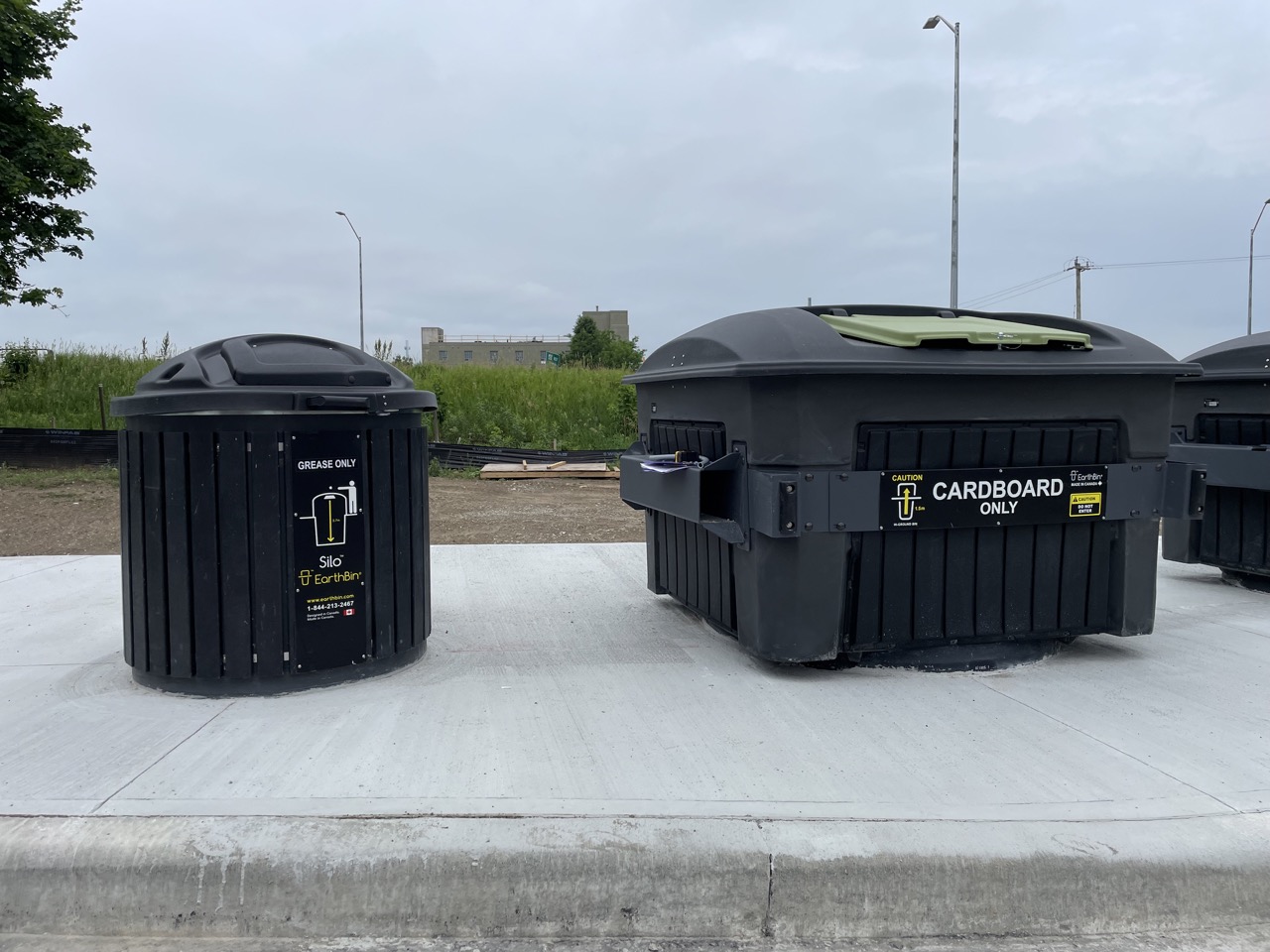 Semi-In-Ground Grease Bin installed at a commercial facility